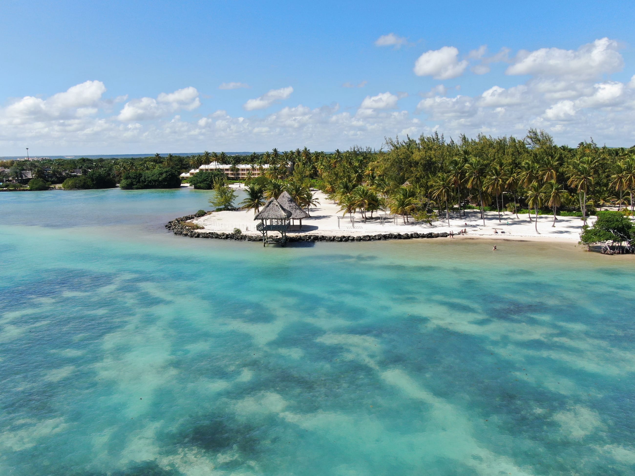 Lagoon-side resort, turquoise water at first light.