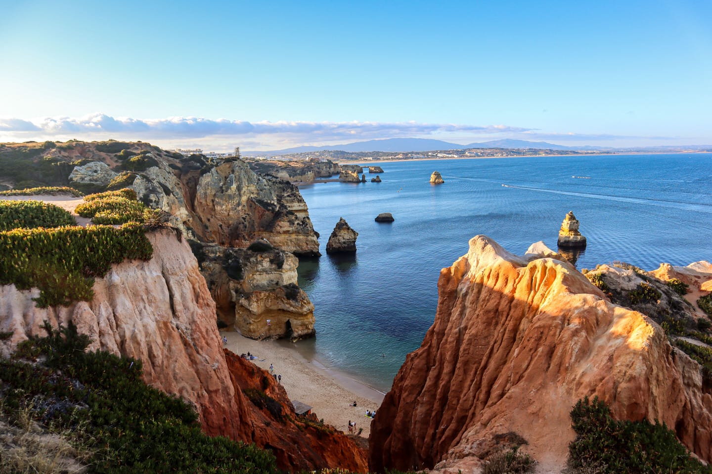 Golden cliffs and turquoise coves of the Algarve.